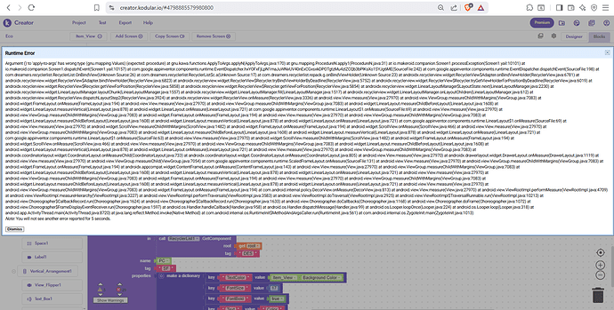 A screenshot of a coding interface with a long block of text code at the top and a visual programming block area at the bottom, displayed within a web browser window on a desktop. (Captioned by AI)