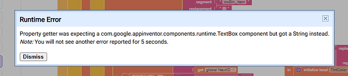 A runtime error message from Google App Inventor indicating a property getter expected a TextBox component but received a String instead, with an option to dismiss and a note about error reporting. (Captioned by AI)