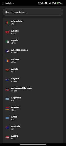 A smartphone screen displays a list of countries starting with the letter 'A' in a dropdown menu for selection. (Captioned by AI)