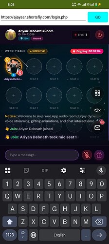 A screenshot of the Aajya Aar app showing Ariyan Debnath's live audio room with options to join seats and a chat input field. (Captioned by AI)