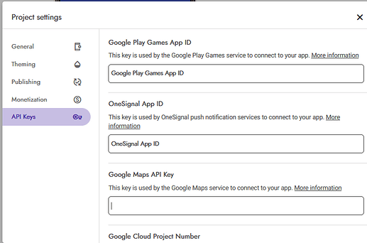 A screenshot of a project settings window focused on the API Keys section, showing input fields for Google Play Games App ID, OneSignal App ID, Google Maps API Key, and Google Cloud Project Number, with a navigation menu on the left side including General, Theming, Publishing, Monetization, and API Keys. (Captioned by AI)